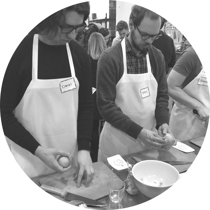 Members of the Scroll team chopping vegetables
